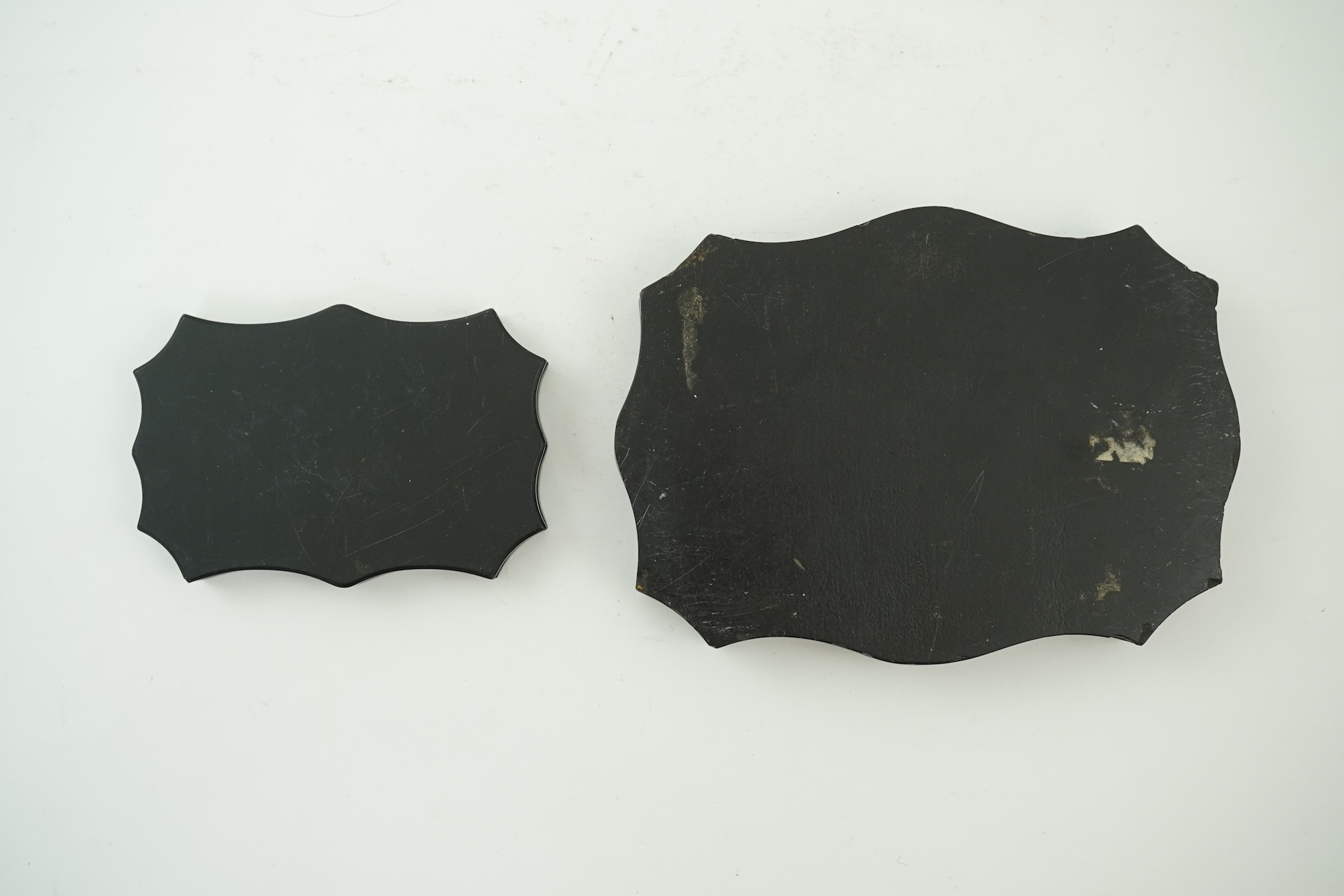 Two Italian micro-mosaic inlaid black slate paperweights, 19th century